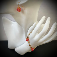 Parure or ""rouge bonbon""
