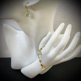Parure or "perle.de rivière"