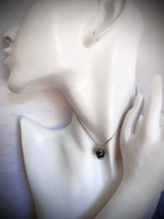 Collier « noir pur »