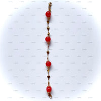 Bracelet or "bonbon rouge"