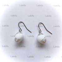 Boucles "blanc.pur"
