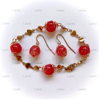 Parure or ""rouge bonbon""